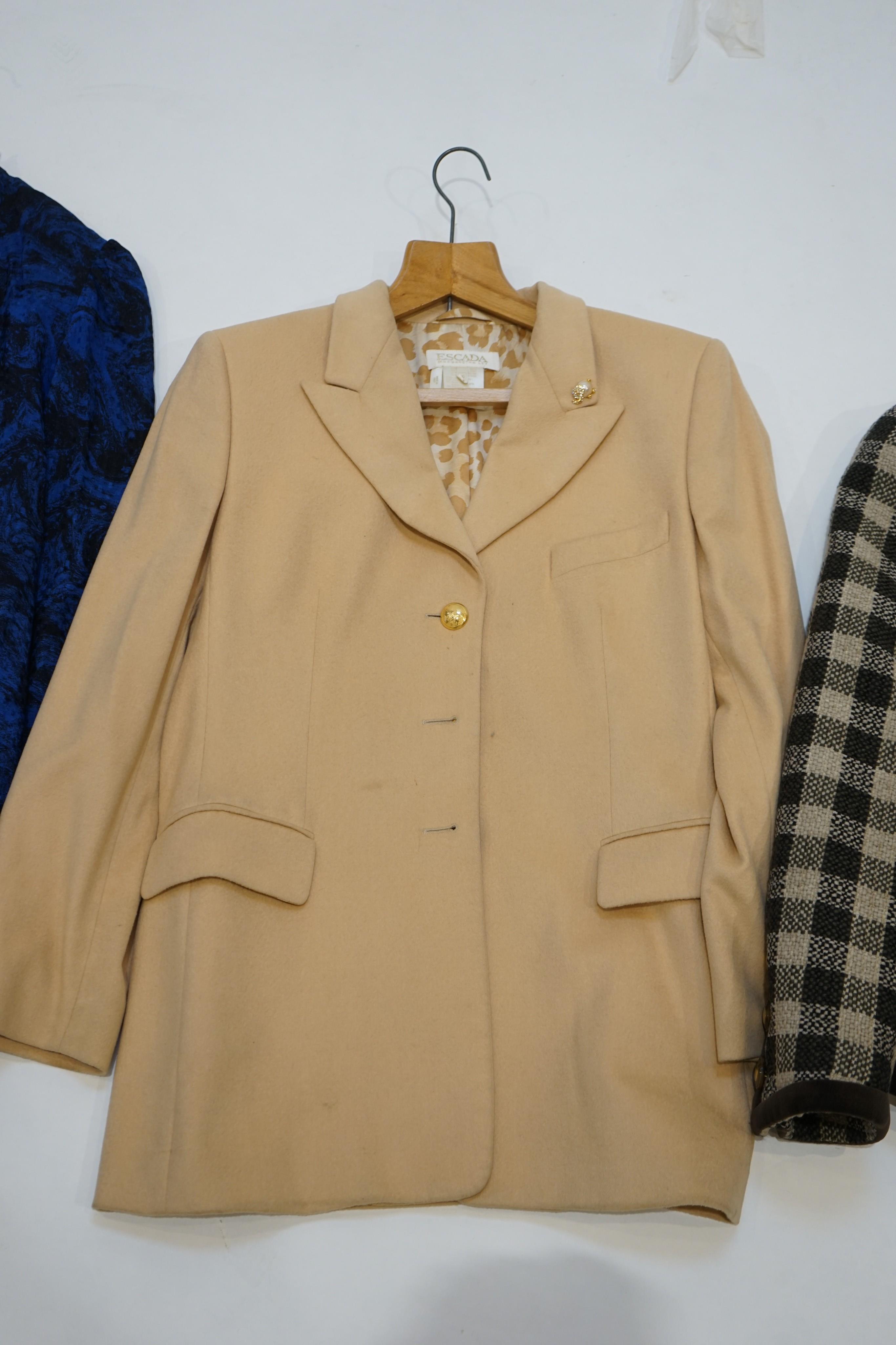 A group of assorted designer clothes, two Escarda jackets, one Aquascutum blazer, one Salvatore Ferragamo jacket (all UK size 16) and one black satin skirt by Emmanuel Ungaro size 10, and Lanvin silk blouse size IT 44